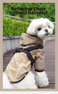 Detail of khaki waterproof dog raincoat with integrated reflective harness and hood