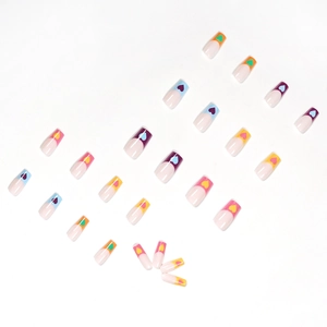Rainbow french heart press-on nails with colorful tips on a clean white background