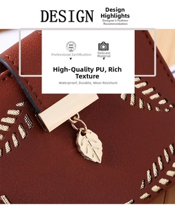 Detailed macro view of laser-cut leaf pattern on brown PU leather wallet with gold charm