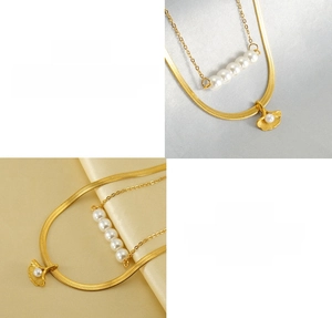 Detail of 18K gold-plated stainless steel ginkgo leaf pendant and double layer pearl chain