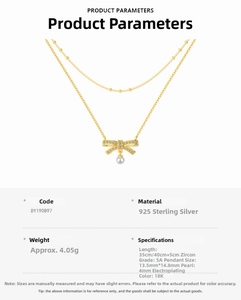 Detail of S925 silver bow necklace with 18K gold plating, cubic zirconia, and pearl
