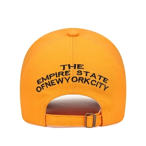 Rear view of orange cotton baseball cap with NYC embroidery and adjustable metal buckle
