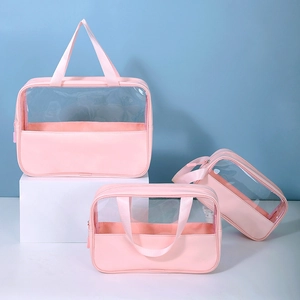 Three-piece set of pink transparent PVC travel cosmetic bags with PU leather trim