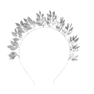 Artistic detailed view of a silver leaf-shaped headband with delicate wire textures