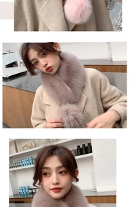 Close-up of soft faux fur collar in light purple with fluffy pompom decorative detail