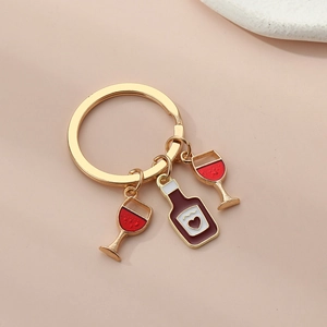 Red wine and glass keychain with heart enamel pendant in light gold finish
