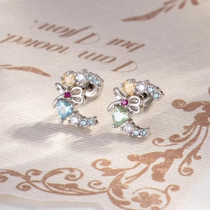 Bow and crescent cartilage studs with vibrant heart-shaped cubic zirconia in silver finish