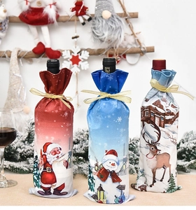 Three festive Christmas wine bottle covers with Santa, Snowman and Reindeer patterns