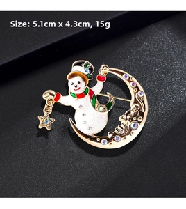 Detail view of snowman on crescent moon brooch with colorful crystals and size measurements