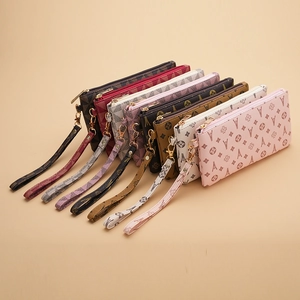 Fashion vintage long zip-around wallets for women in multiple colors with wrist strap