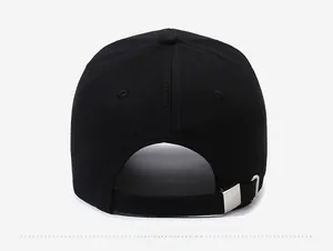 Rear view of black cotton baseball cap showing adjustable silver metal buckle strap