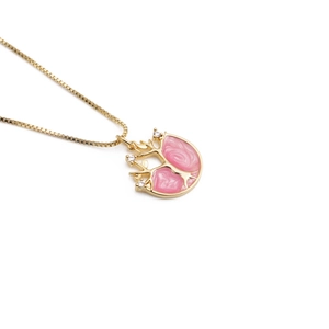 Gold plated couple necklace featuring a pink enamel tree pendant with small diamonds