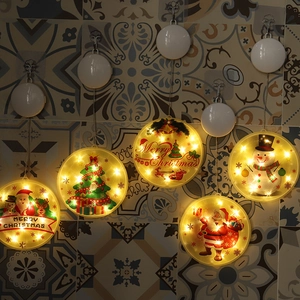 Five circular LED Christmas window lights with warm yellow Santa and Snowman hanging ornaments