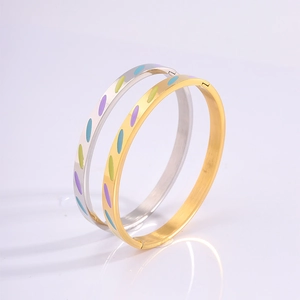 Titanium steel bangles with colorful enamel oval patterns and secure clasp closure