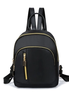 Waterproof black nylon mini backpack for women with gold zippers and leather straps