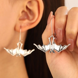 Gothic vintage silver bat dangle earrings for women featuring detailed wing patterns