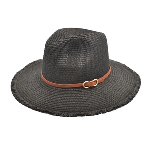 Detail of dark straw fedora with brown leather band and gold horse-bit metal buckle