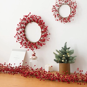 Artificial red berry wreath and garland set for Christmas festive home wall decoration
