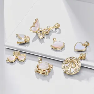 Elegant 18k gold plated charms featuring mother of pearl butterfly and heart shapes