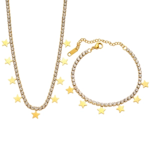 Elegant gold-tone chain necklace and bracelet set with star charms and zircon crystals