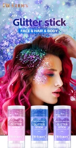 Three multi-use glitter sticks in pink, blue, and mermaid shades for face, hair, and body