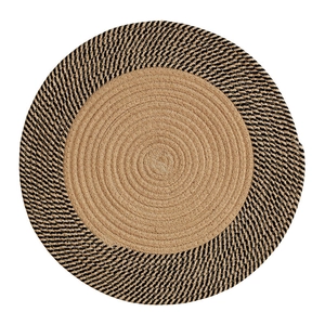 Japanese style round jute woven rug with a two-tone natural and black spiral pattern