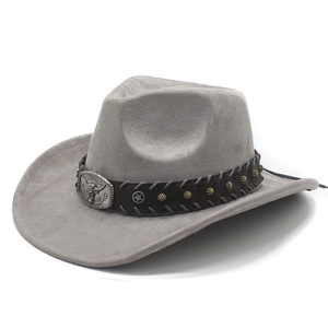 Detail of gray suede cowboy hat featuring a vintage bull head and star metal buckle