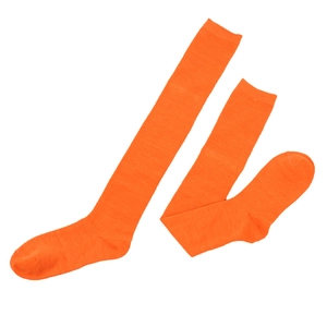 Close-up of bright orange over-the-knee socks with a premium knitted texture