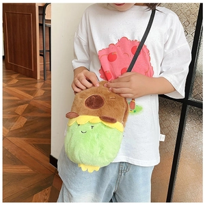 Detail of cute Capybara plush crossbody bag featuring brown and green furry textures
