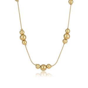 Fashionable gold stainless steel necklace featuring various sized polished beads on white background