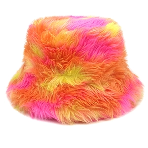 Close-up of rainbow tie-dye faux fur bucket hat showing soft plush texture and vibrant colors