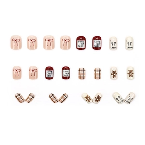 Creamy bear and red bow press-on nail kit with cute plaid patterns and glossy finish