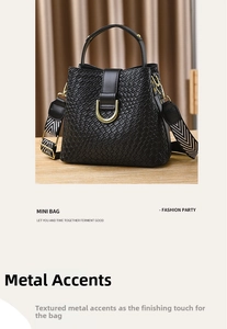 Macro detail of black woven leather mini bucket bag with gold hardware and wide strap
