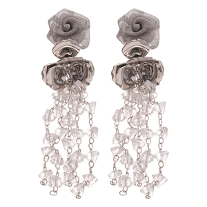 Silver rose floral earrings with sparkling crystal tassels on a clean white background