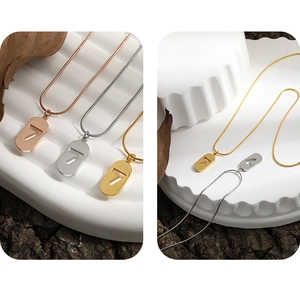 Detailed view of the lucky number 7 pendant on a sleek snake chain in three colors