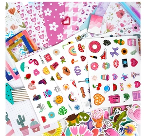 Close-up of colorful DIY journal stickers featuring food, animals and decorative icons