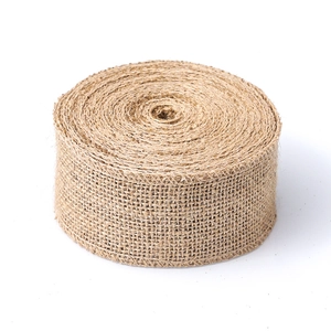 Detail of natural jute burlap roll showing rustic woven texture and eco-friendly fiber