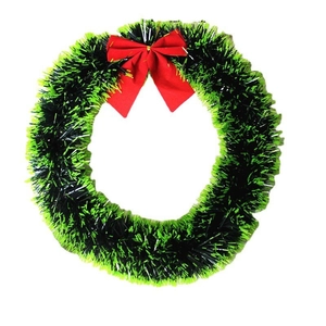 Ghirlanda di Natale con festone verde e fiocco rosso per decorazione di vetrine