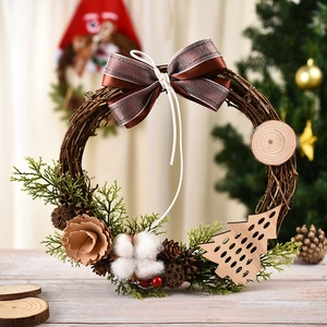 Christmas wreath with Santa Claus theme featuring dried vines and cotton accents