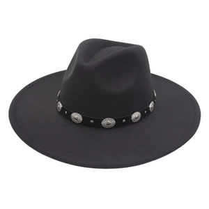 Detail of black fedora hat with vintage silver embossed metal disks and studs on band