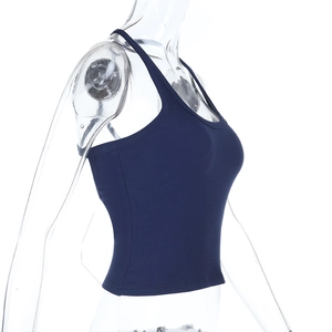 Detail view of the fine ribbed texture and racerback design of this slim navy tank top