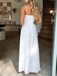 Elegant white long dress featuring a sophisticated lace-up back design and satin finish