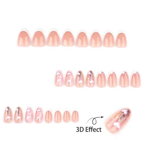 3D white French press-on nails with pink heart patterns and glitter finish