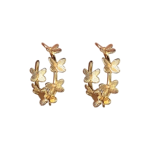 Golden butterfly C-shaped stud earrings in a minimalist layered design for women