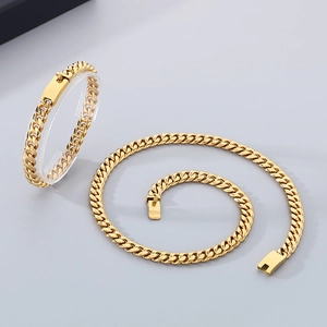 Golden 8mm Cuban link chain necklace and bracelet set in polished stainless steel finish