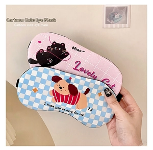 Detail of pink cat and blue dog sleep masks with breathable fabric and elastic straps