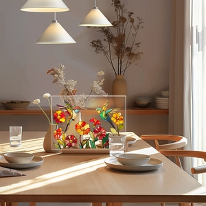 Macro view of colorful hummingbird and floral patterns on clear acrylic decor panel