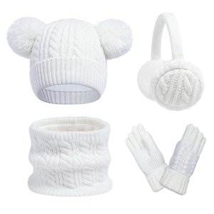 Detail view of white winter set with pom-pom hat, earmuffs, scarf, and gloves