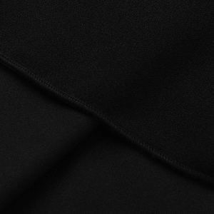 Macro du tissu noir de haute qualité avec coutures fines et détails d'ourlet soignés