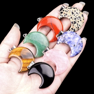 Natural crystal moon pendants in assorted gemstone colors with silver metal clasp hooks